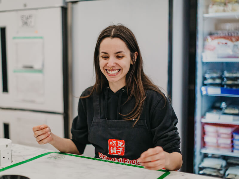 woman smiling at cooking class